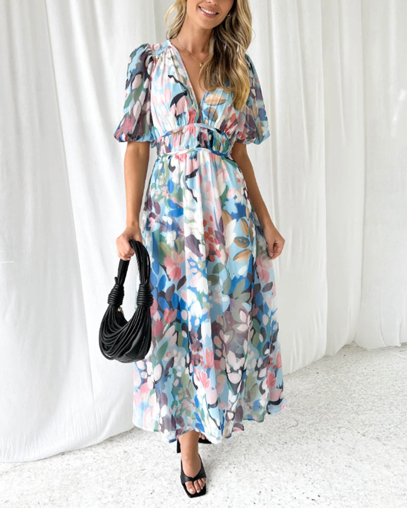 Vestido largo elegante con estampado floral, manga larga y escote pronunciado