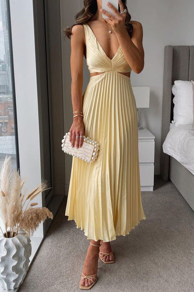Vestido largo con tirantes finos espalda descubierta y falda plisada ideal para ocasiones especiales