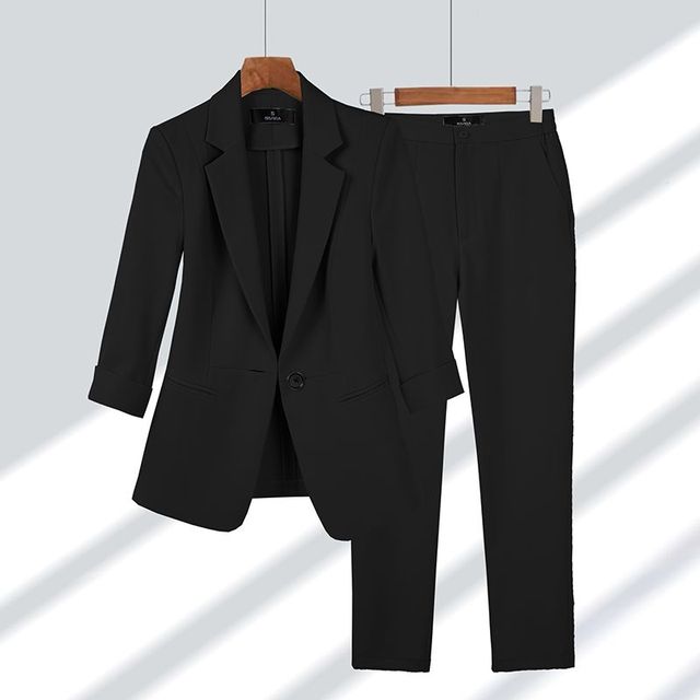 Conjunto elegante de chaqueta y pantalón para mujer estilo formal
