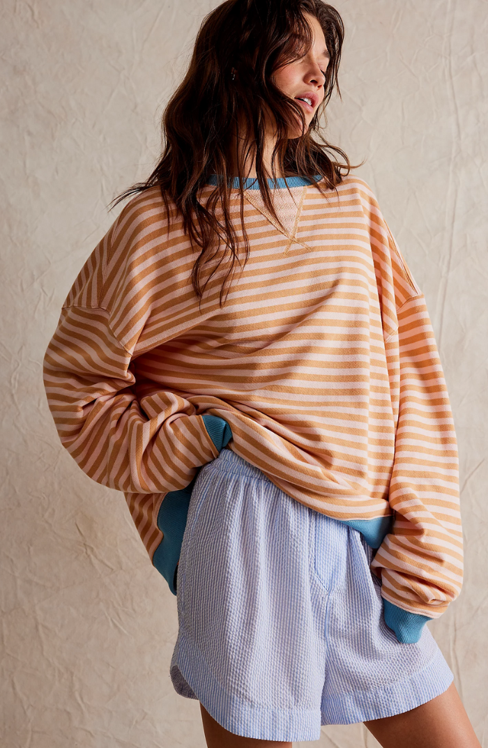 Suéter Oversize con Rayas para un Mira Moderno