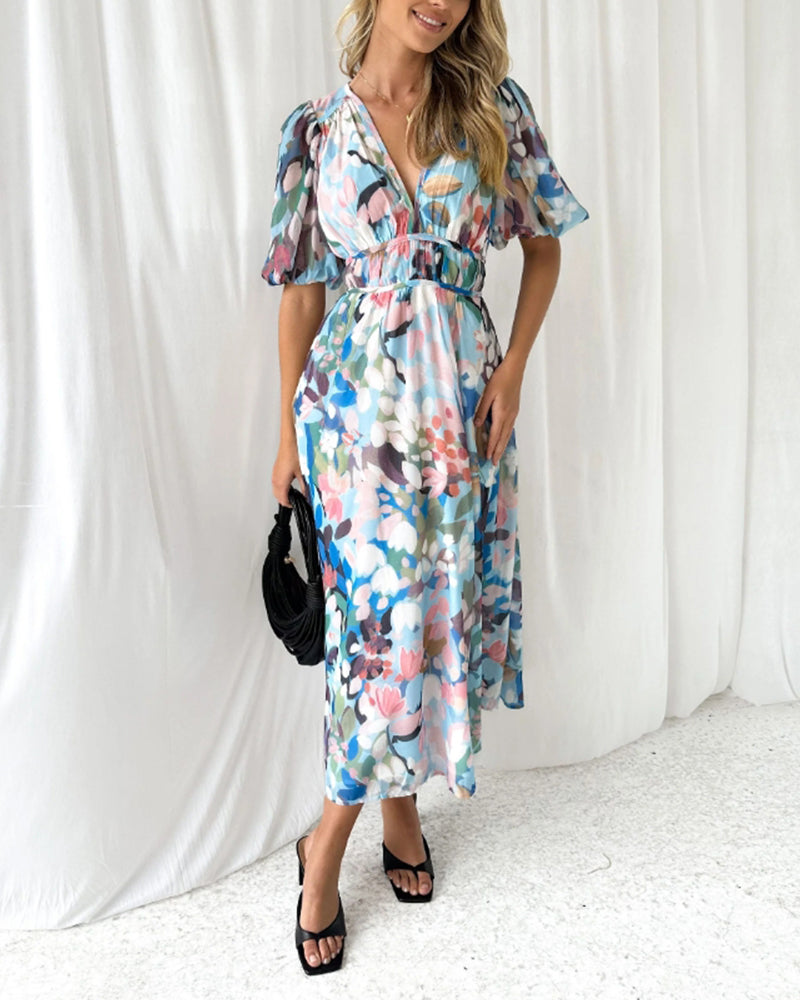 Vestido largo elegante con estampado floral, manga larga y escote pronunciado