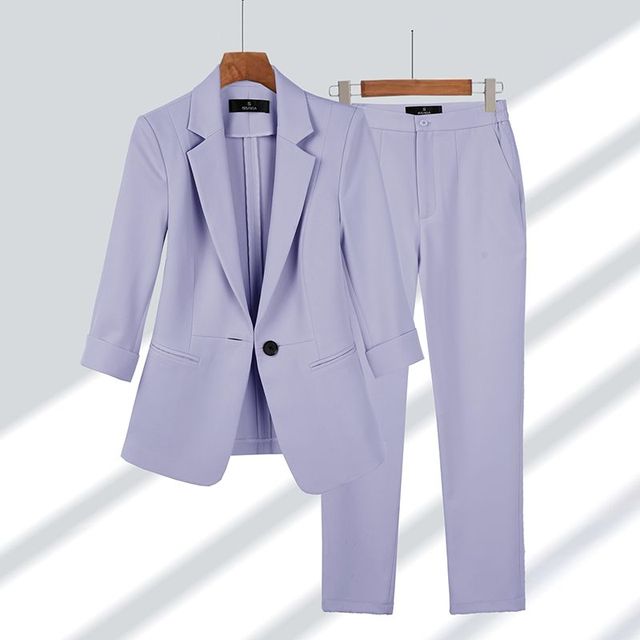 Conjunto elegante de chaqueta y pantalón para mujer estilo formal
