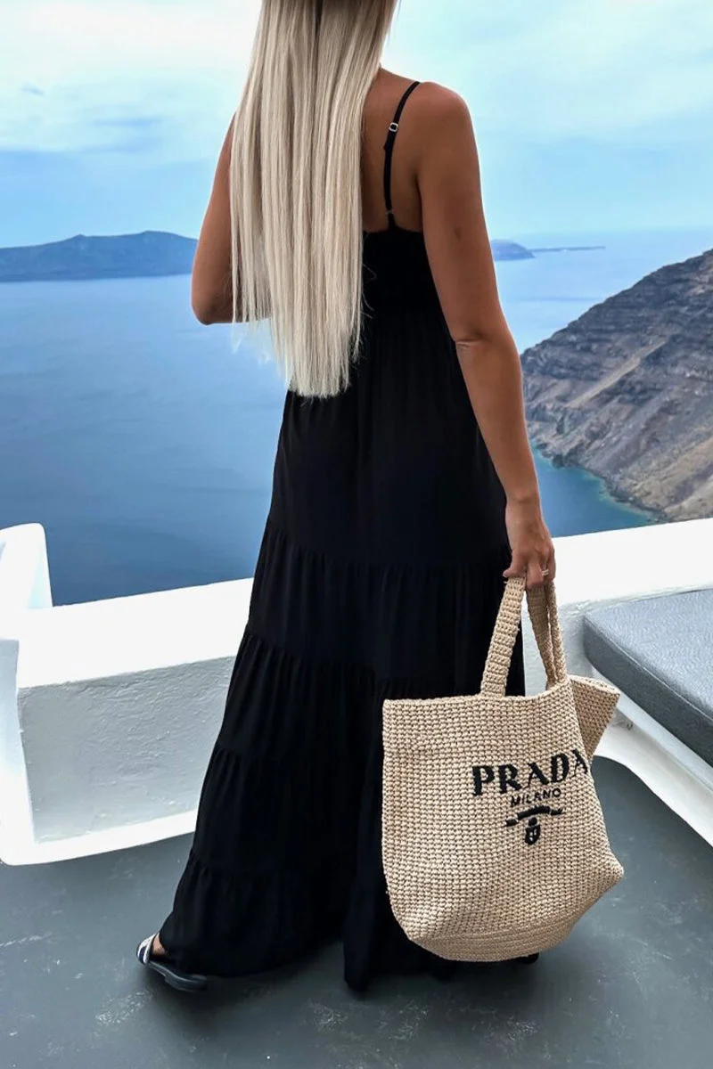 Vestido largo elegante con escote en V y falda de capas plisada ideal para cualquier ocasión