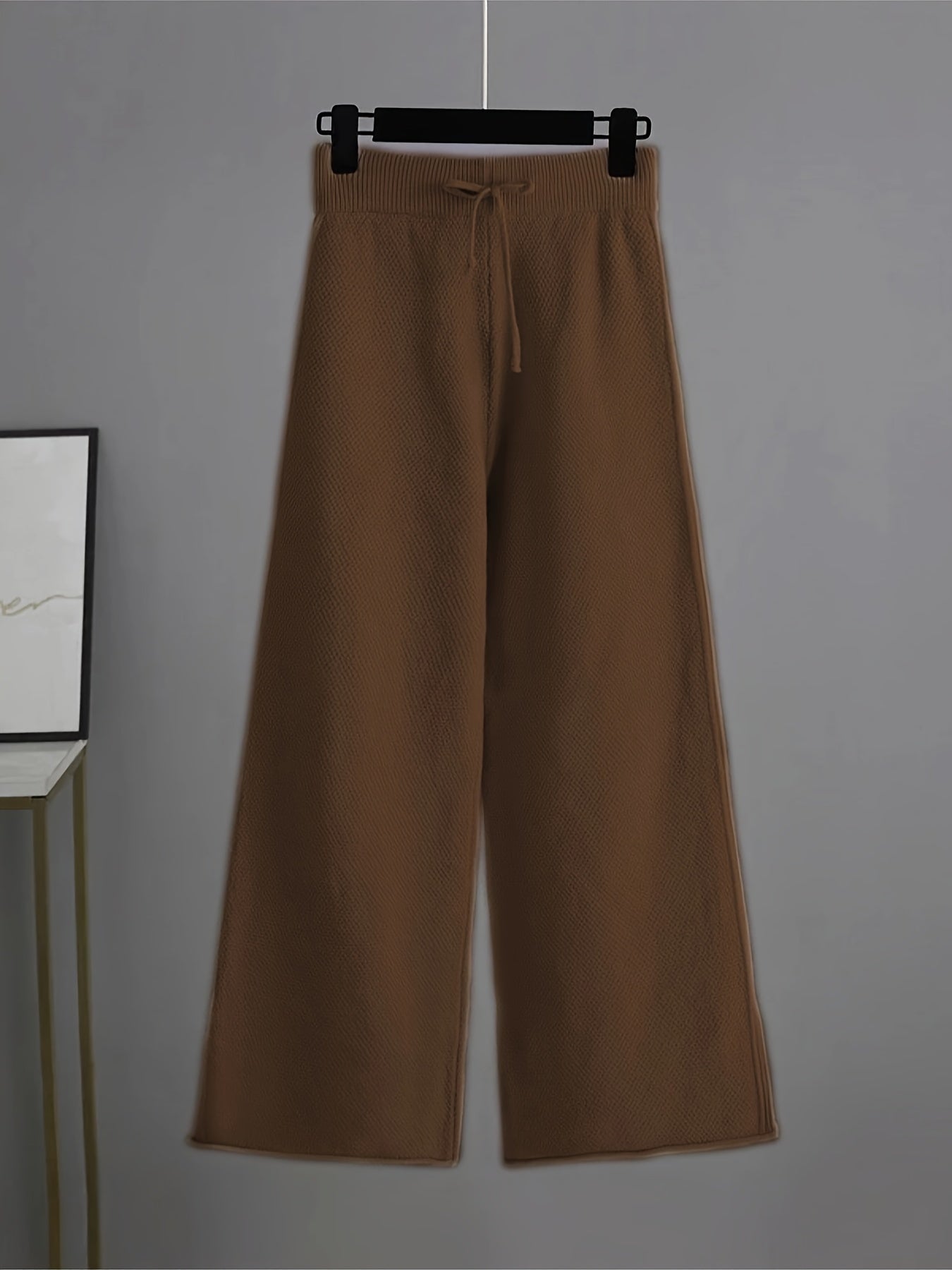 Conjunto elegante de jersey y pantalones anchos para mujer