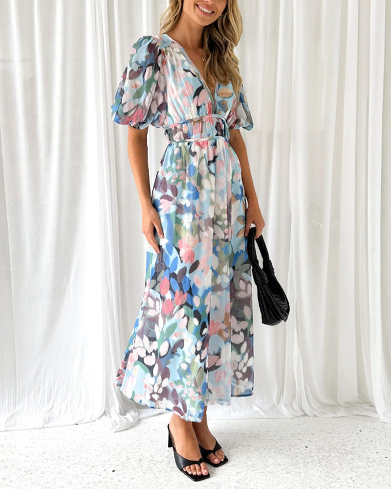 Vestido largo elegante con estampado floral, manga larga y escote pronunciado