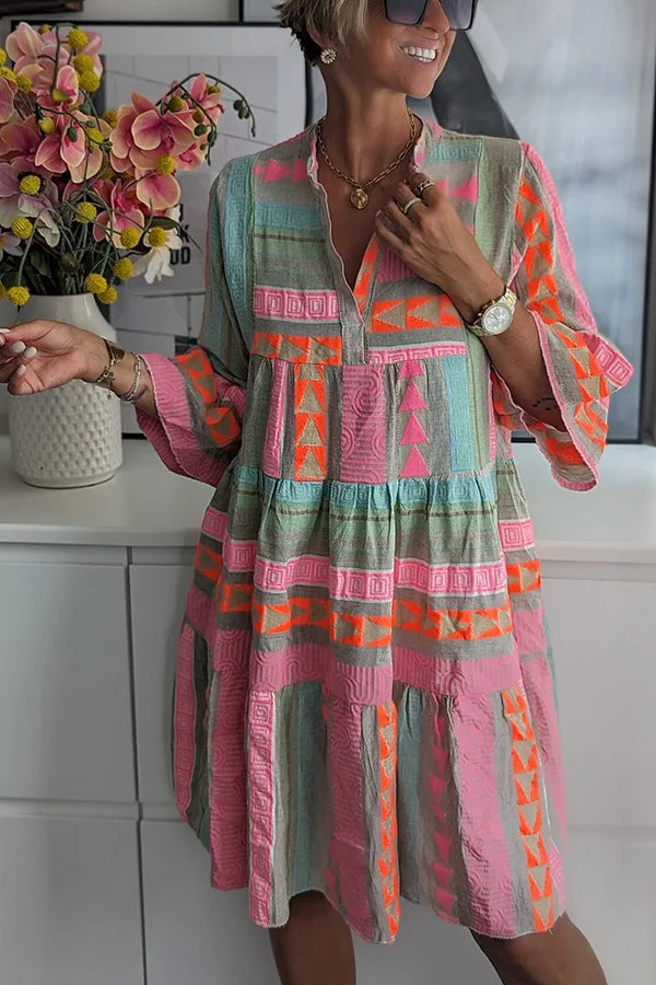 Vestido corto de estilo bohemio con mangas largas y sueltas