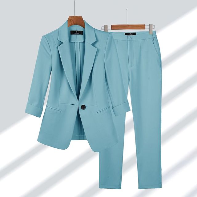 Conjunto elegante de chaqueta y pantalón para mujer estilo formal