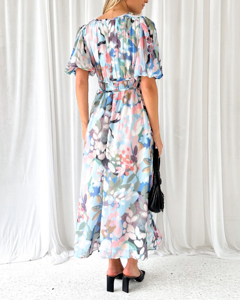 Vestido largo elegante con estampado floral, manga larga y escote pronunciado