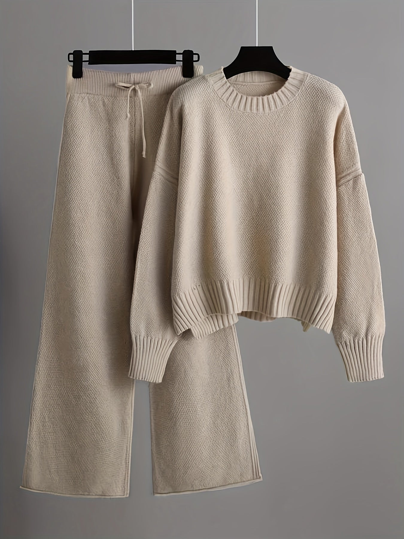 Conjunto elegante de jersey y pantalones anchos para mujer