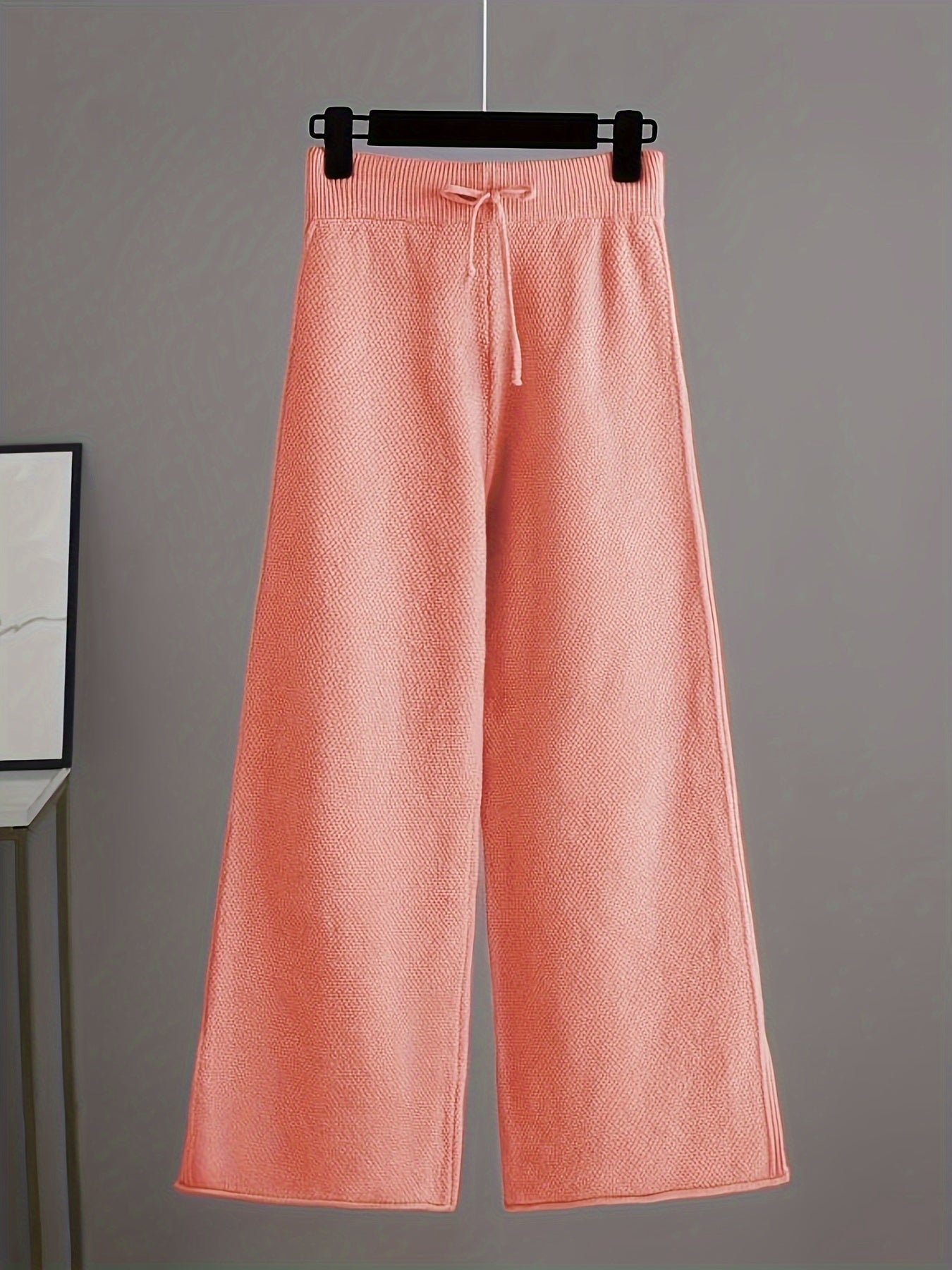 Conjunto elegante de jersey y pantalones anchos para mujer