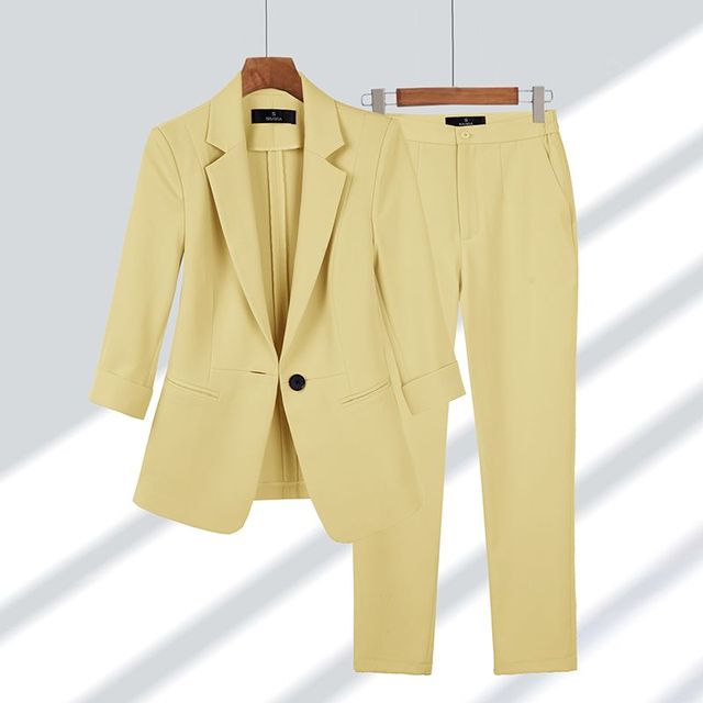 Conjunto elegante de chaqueta y pantalón para mujer estilo formal