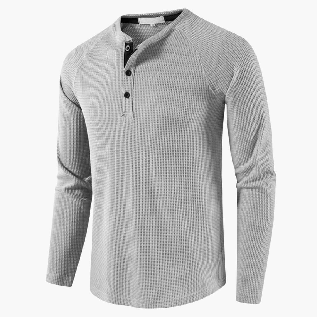 Camiseta de hombre con cierre de botones a medio pecho y mangas largas para un estilo moderno
