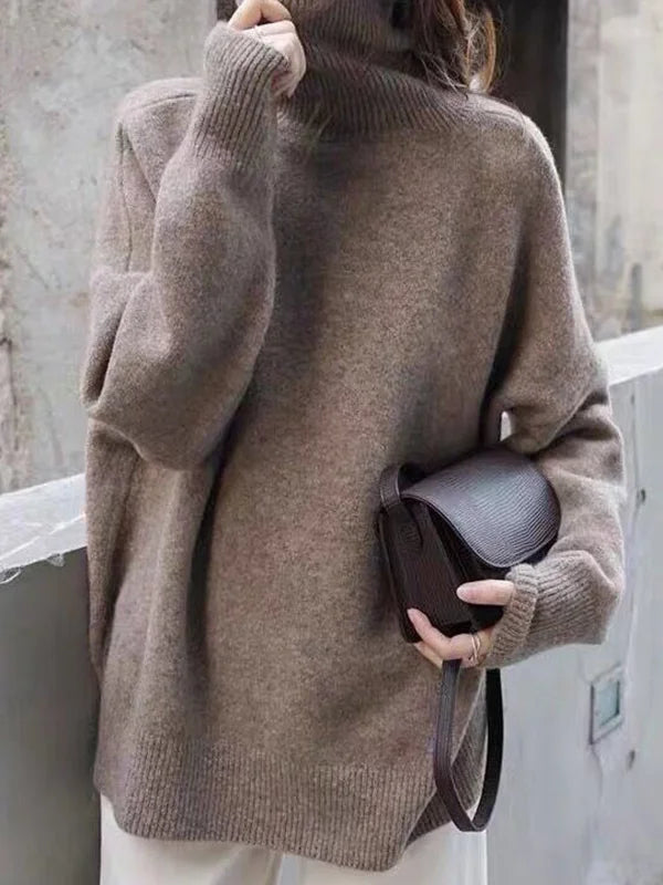 Elegante suéter extragrande con mangas largas y cuello alto