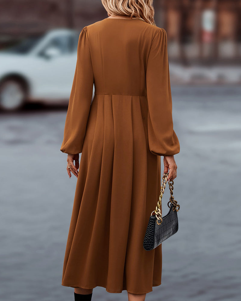 Vestido midi elegante de otoño con mangas largas abotonadas