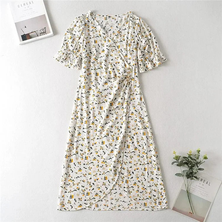 Vestido midi veraniego con escote en V y mangas abullonadas con delicado estampado floral