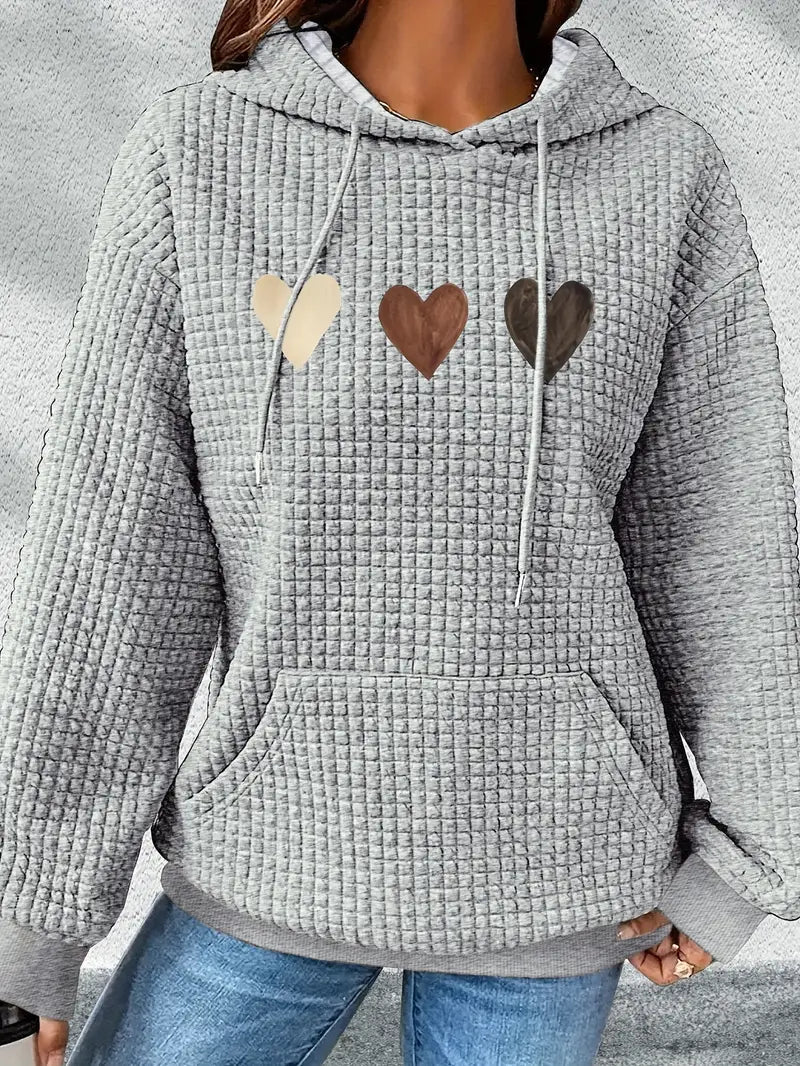 Suéter elegante para mujer con diseño de corazones