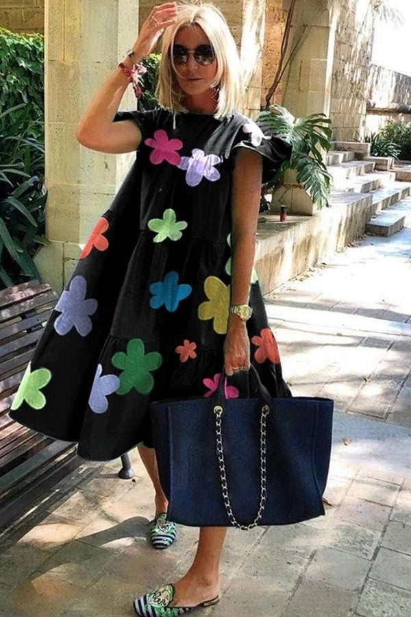 Vestido fluido de silueta en A con estampado de flores grandes para un mira elegante