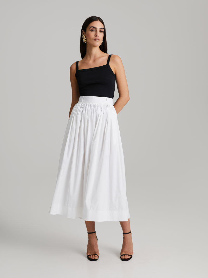 Falda midi amplia con estilo actual para un mira versátil
