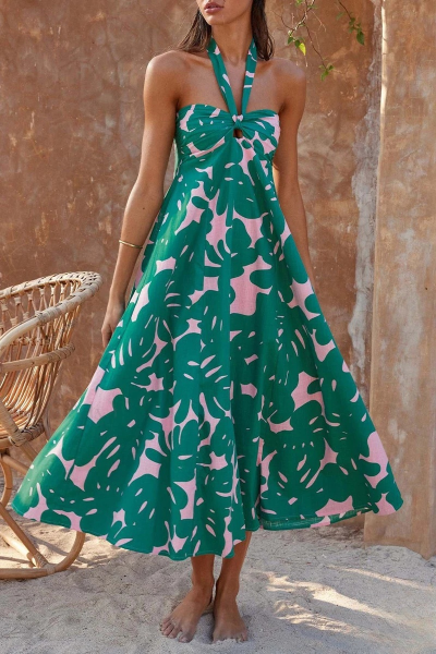 Vestido largo bohemio con estampado floral y diseño de espalda descubierta ideal para cualquier ocasión