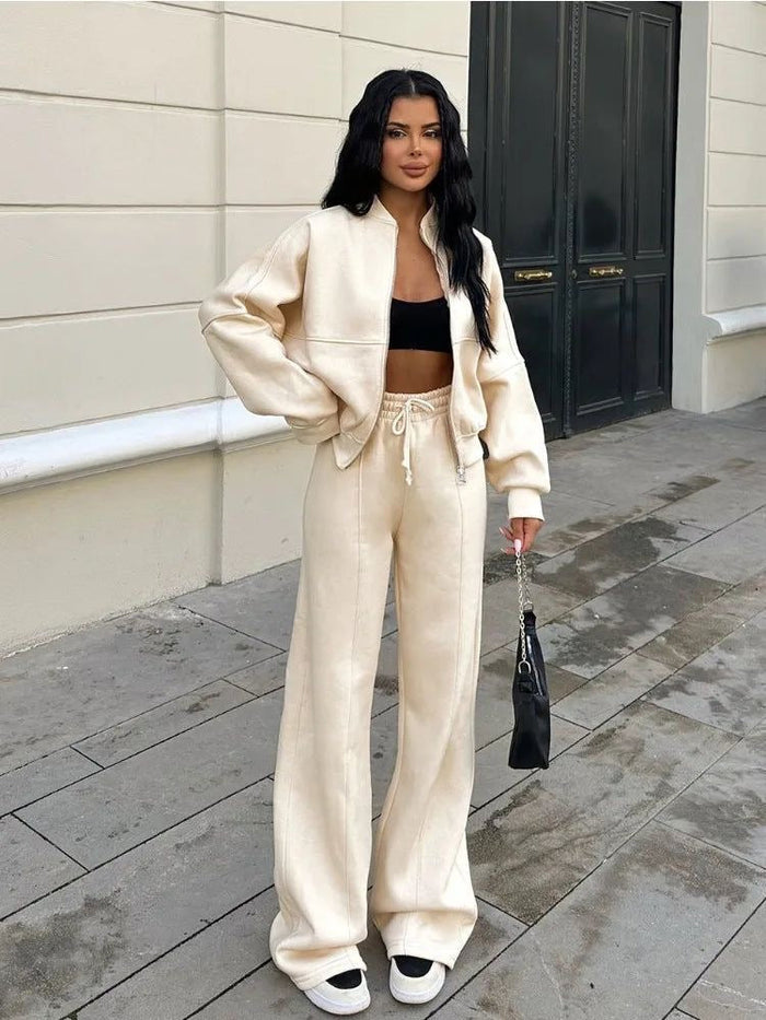 Conjunto deportivo casual para mujer con chaqueta de cremallera y pantalón acampanado de talle alto