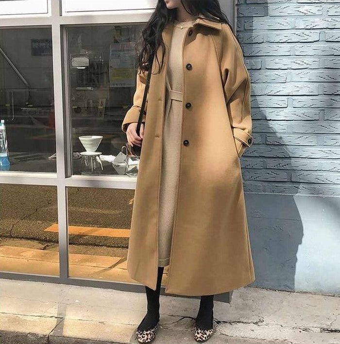Chaqueta larga con diseño elegante para mujer