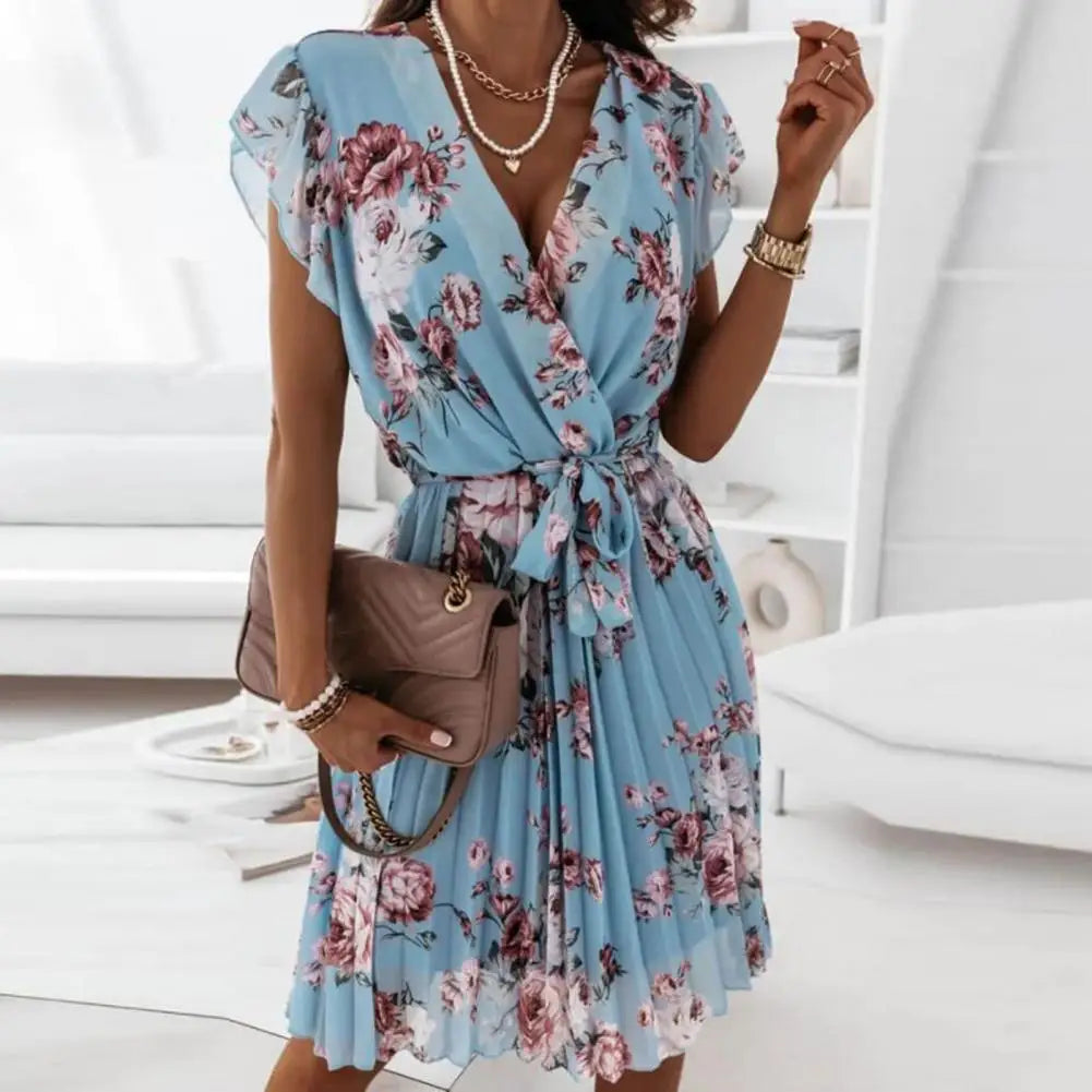 Vestido elegante con estampado floral y escote pronunciado para un mira sofisticado