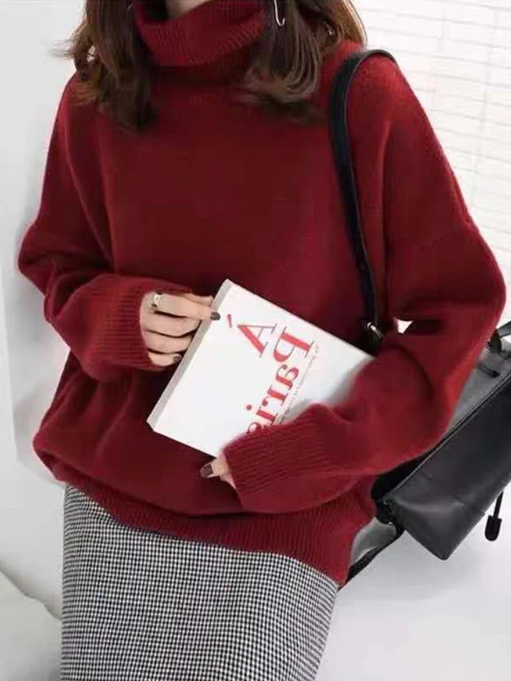 Elegante suéter extragrande con mangas largas y cuello alto