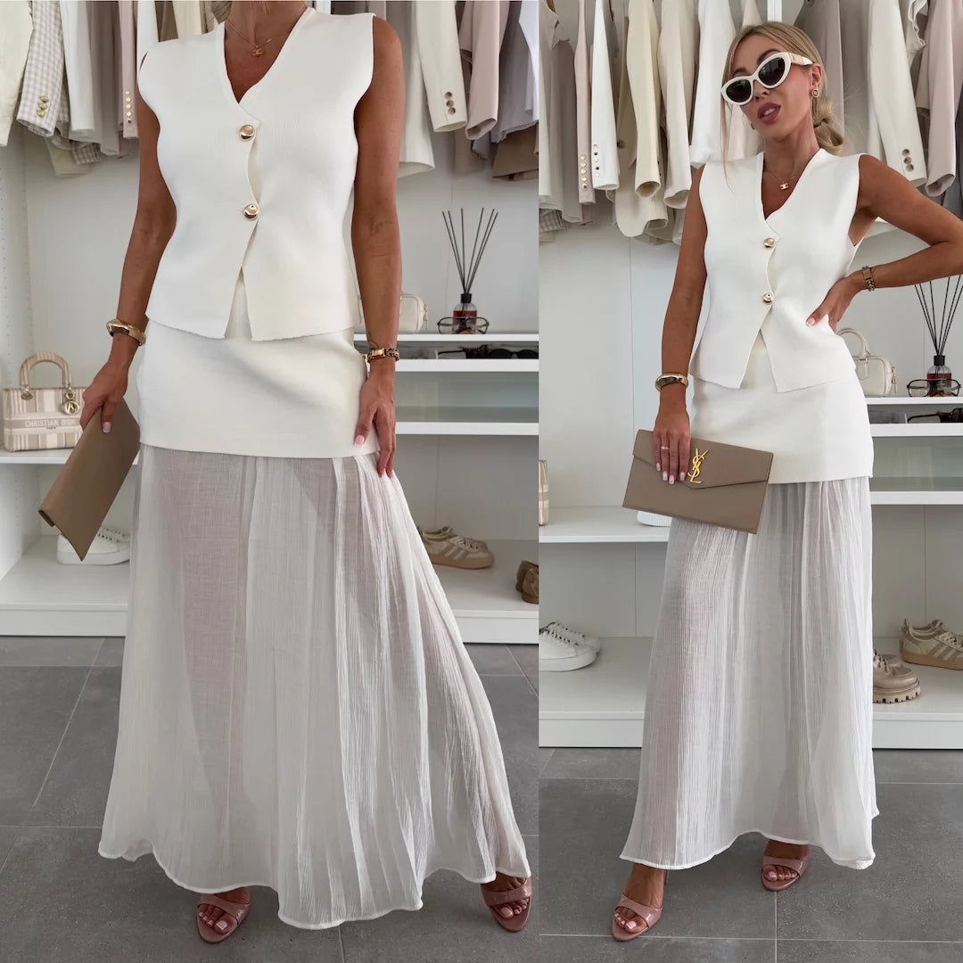 Conjunto elegante para mujer con falda larga plisada y chaleco abotonado