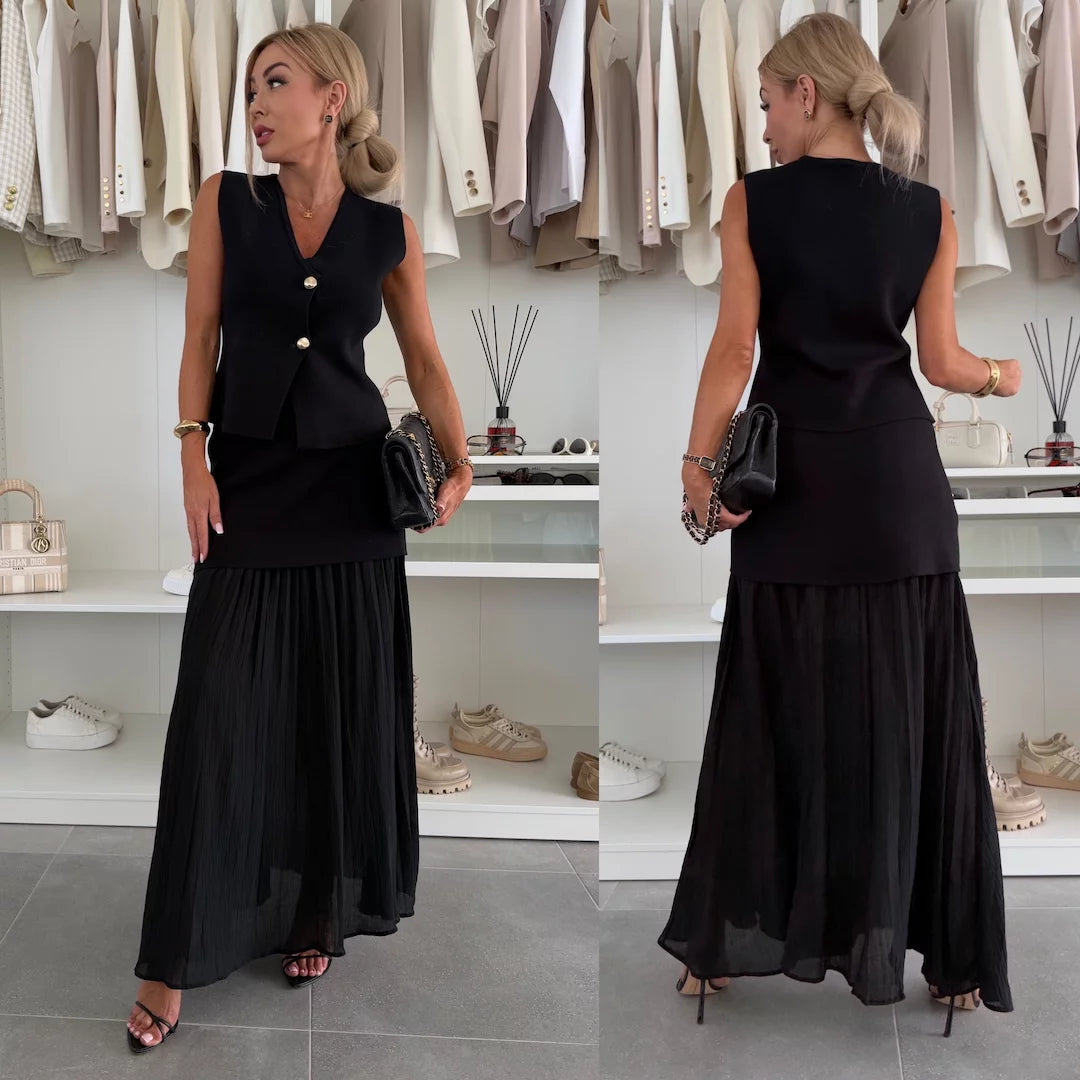 Conjunto elegante para mujer con falda larga plisada y chaleco abotonado