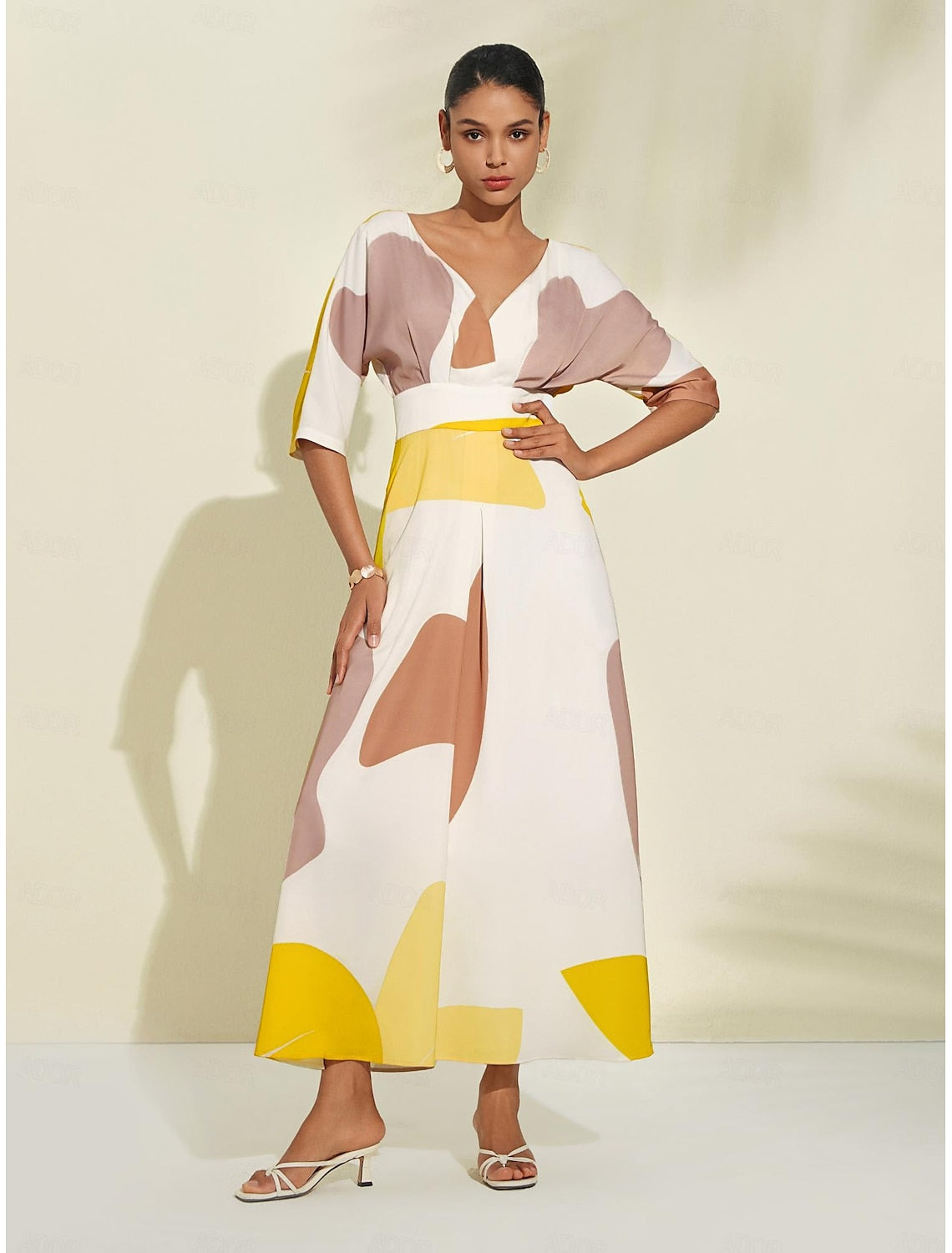 Vestido largo de verano elegante con escote recortado y manga tres cuartos