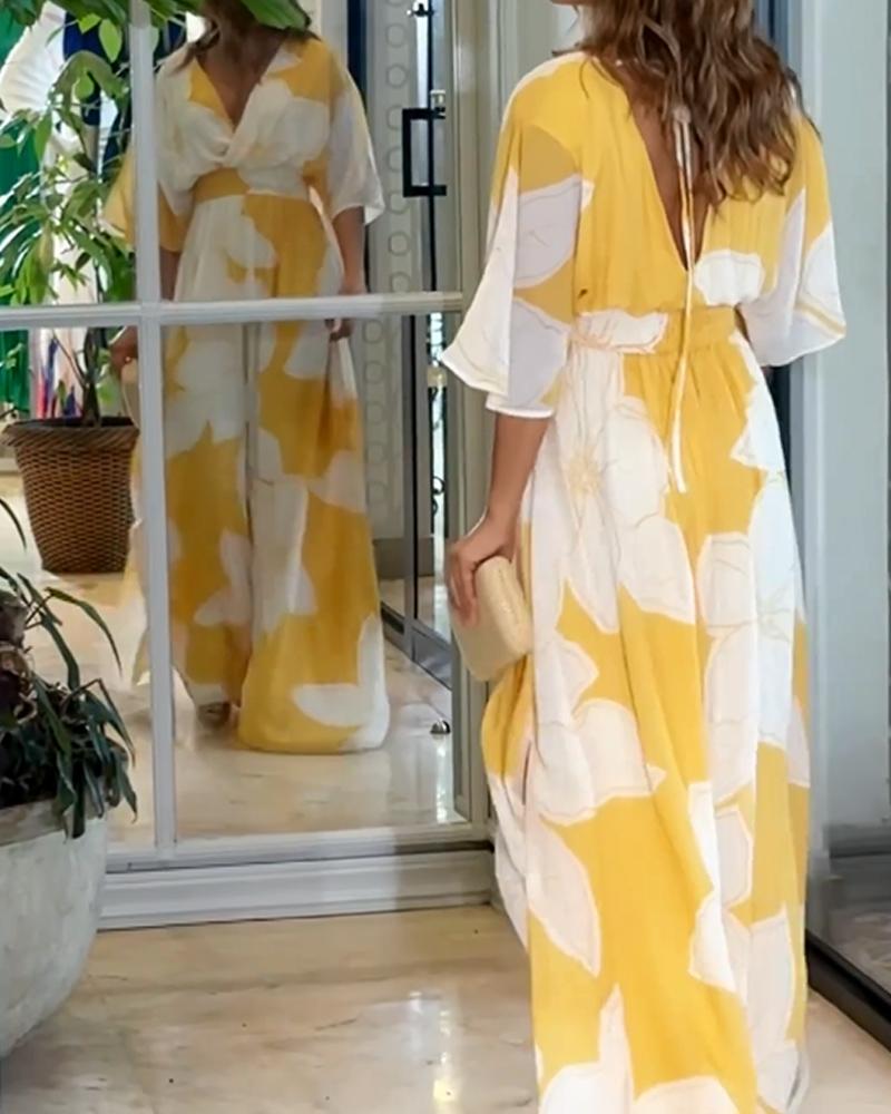 Vestido maxi floral con mangas murciélago