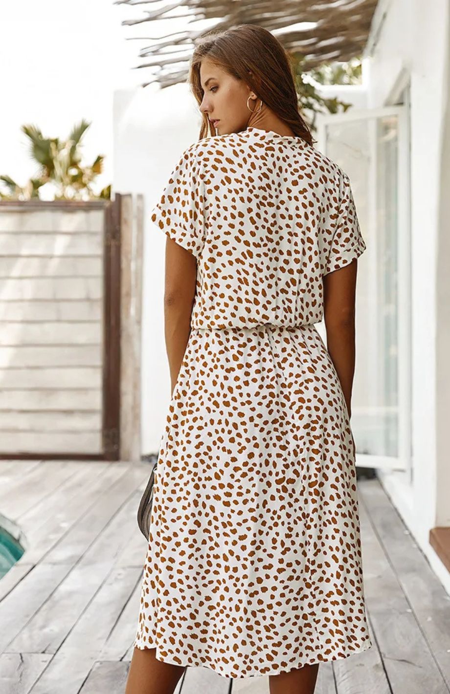 Vestido midi elegante ideal para primavera y entretiempo