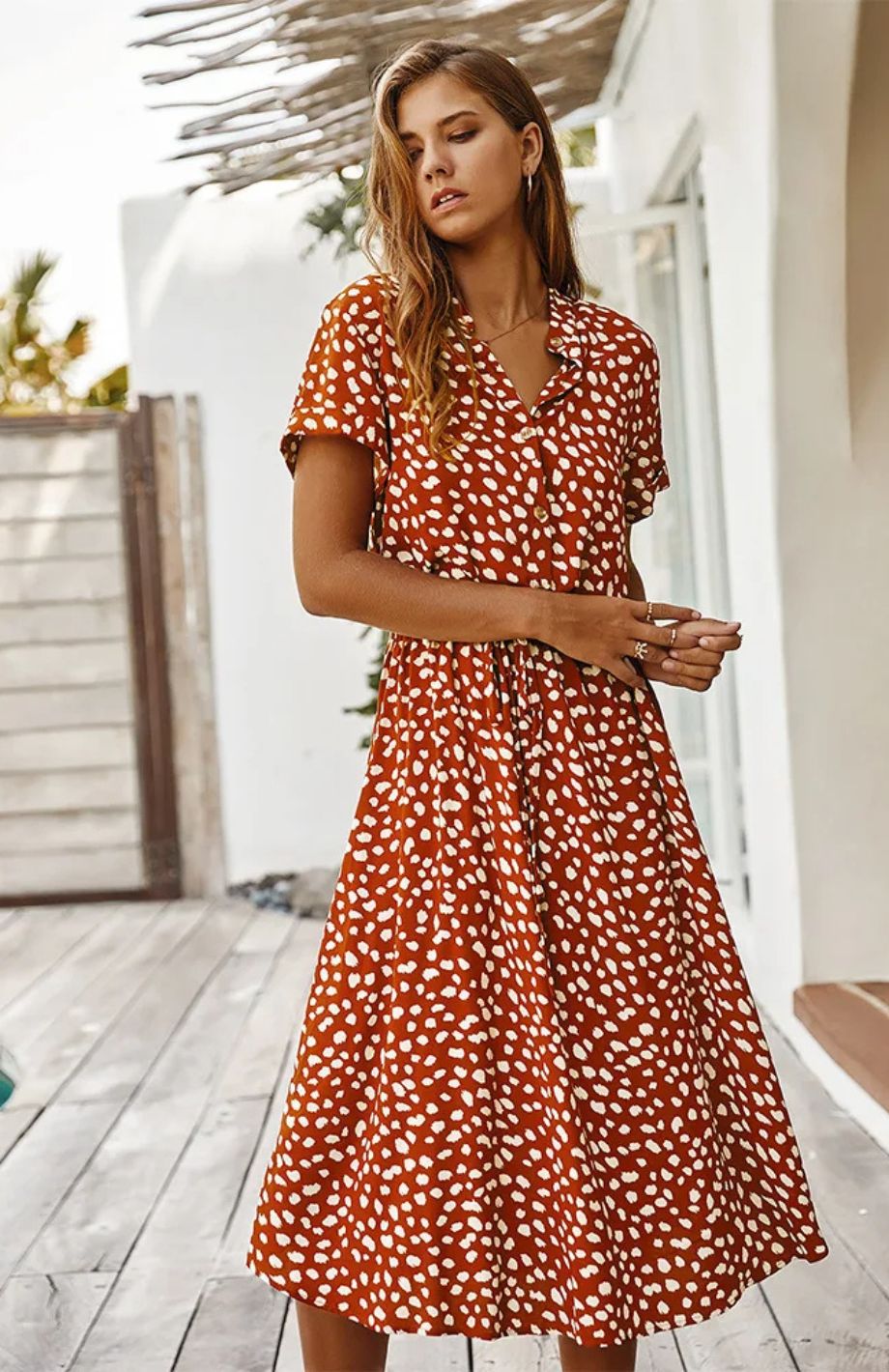 Vestido midi elegante ideal para primavera y entretiempo