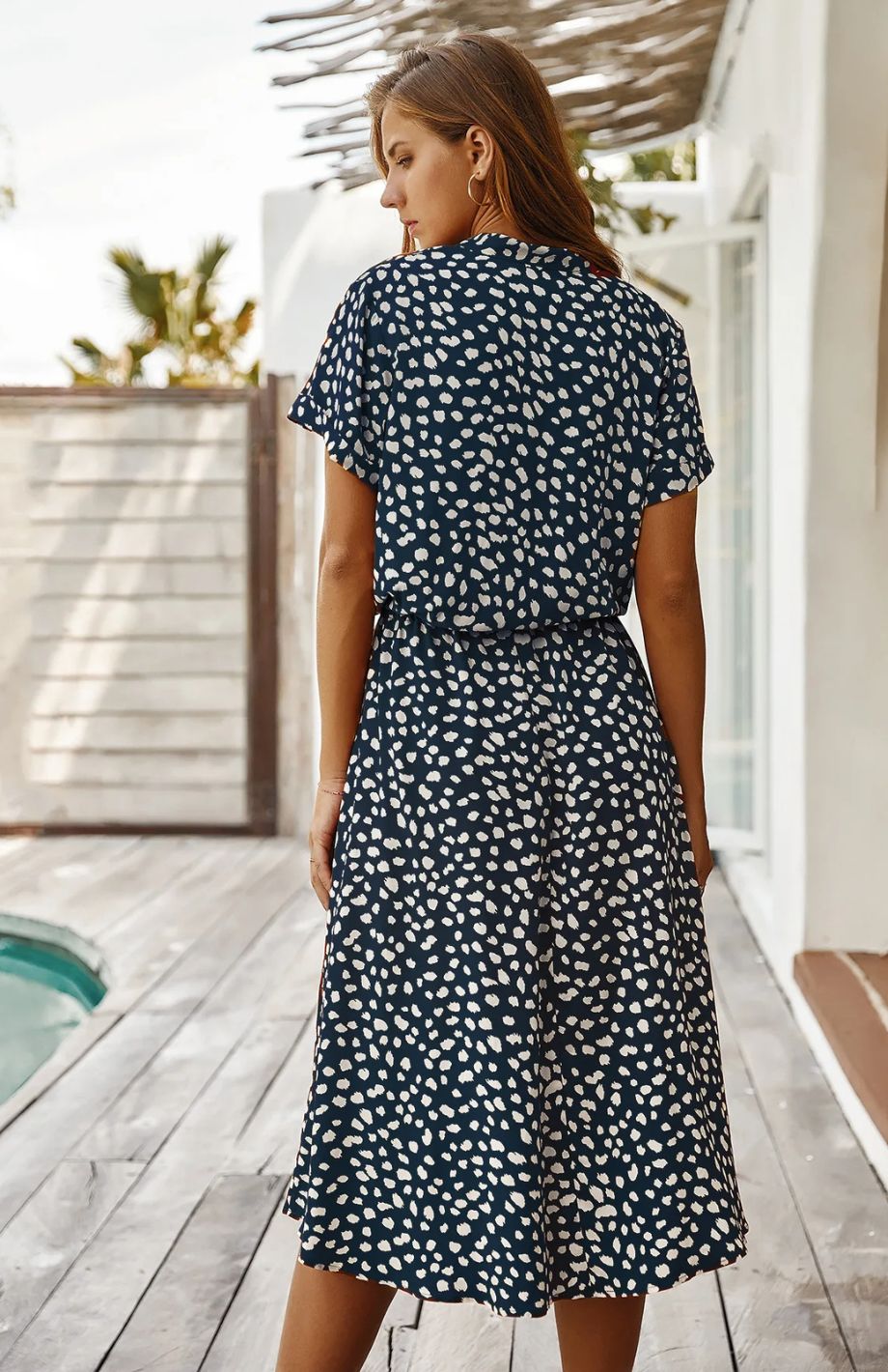 Vestido midi elegante ideal para primavera y entretiempo