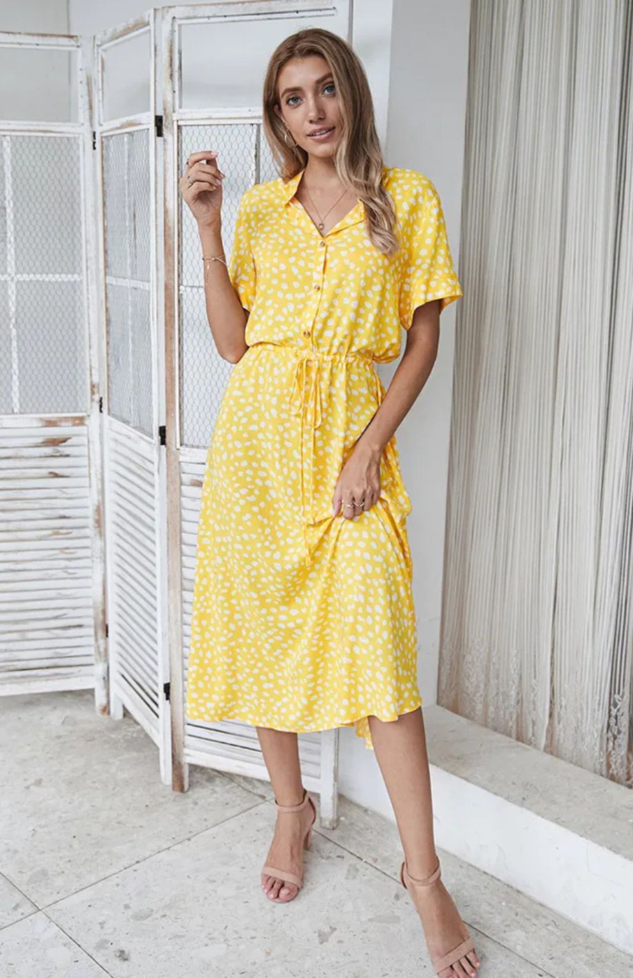 Vestido midi elegante ideal para primavera y entretiempo