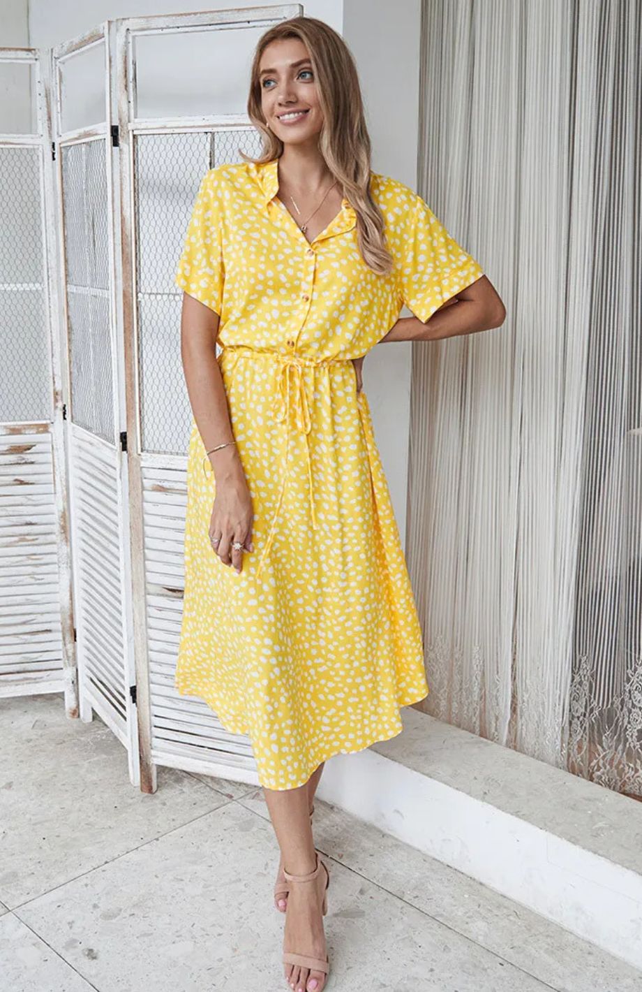 Vestido midi elegante ideal para primavera y entretiempo