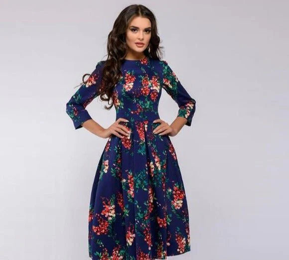 Vestido midi elegante con falda amplia y estampado floral para un mira sofisticado