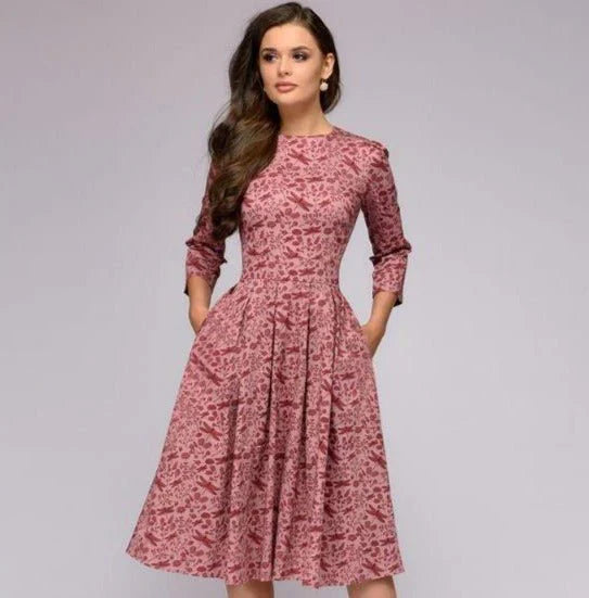 Vestido midi elegante con falda amplia y estampado floral para un mira sofisticado