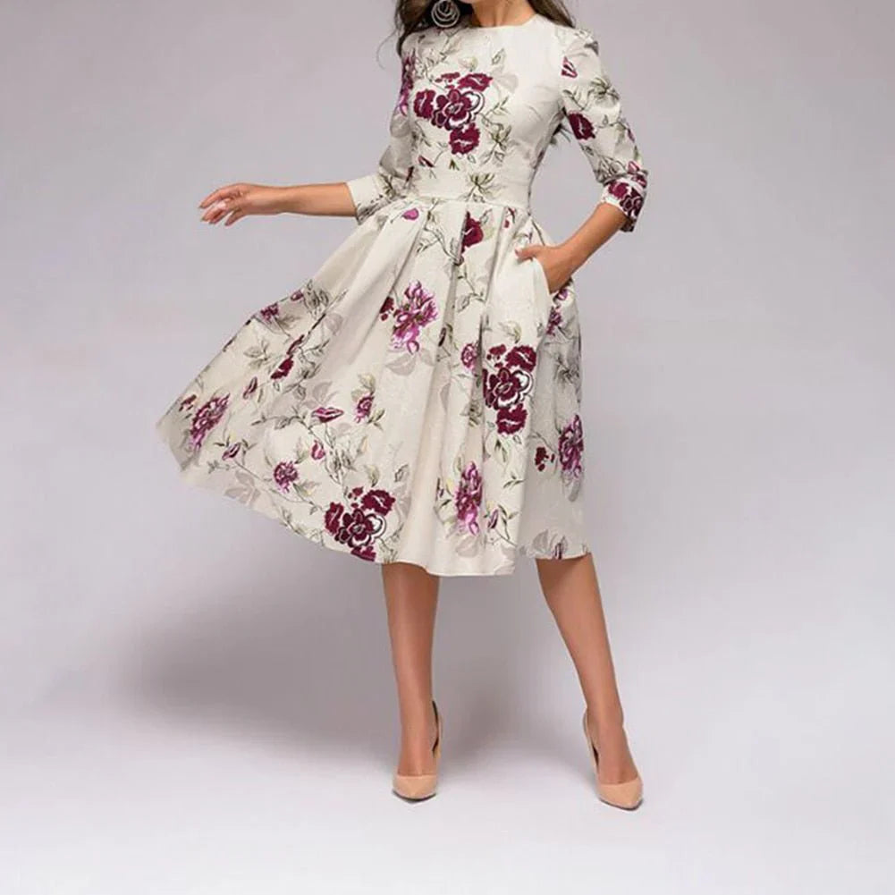 Vestido midi elegante con falda amplia y estampado floral para un mira sofisticado