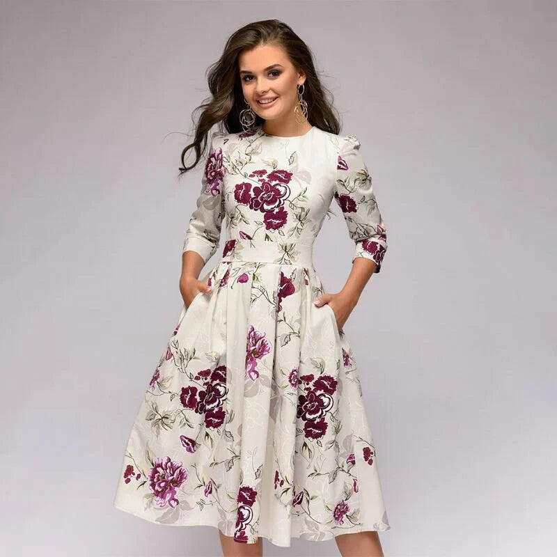 Vestido midi elegante con falda amplia y estampado floral para un mira sofisticado