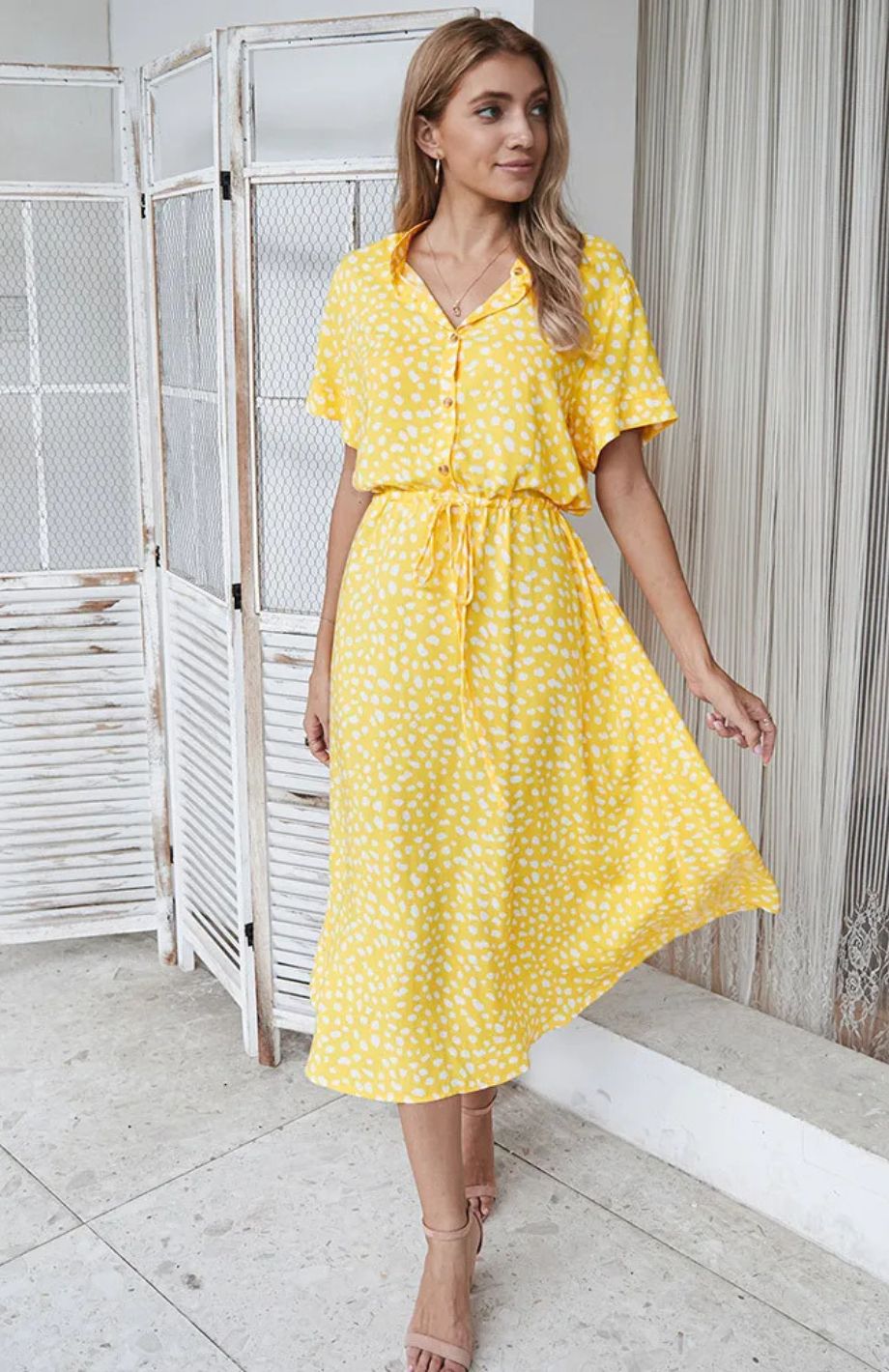 Vestido midi elegante ideal para primavera y entretiempo