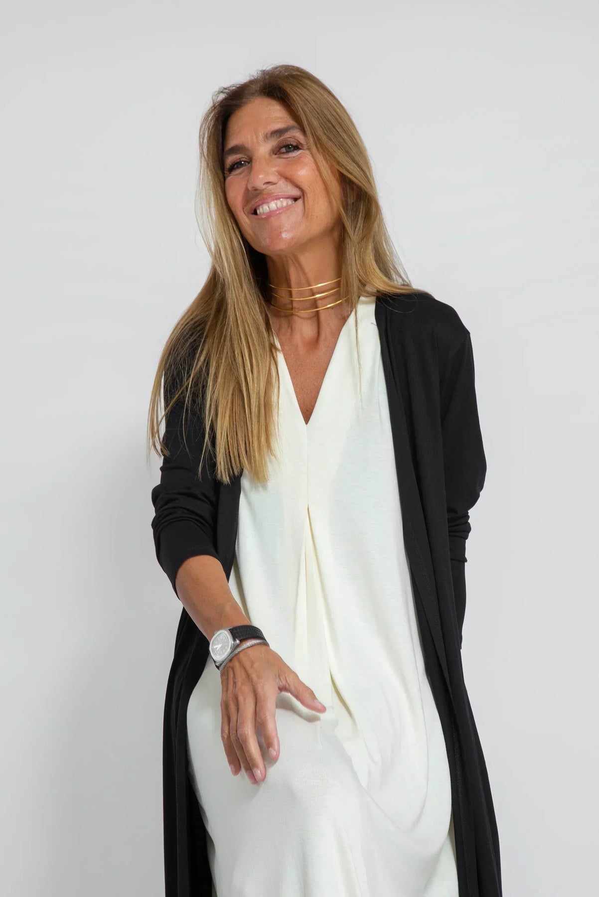 Conjunto elegante de chaleco y vestido largo para un mira sofisticado