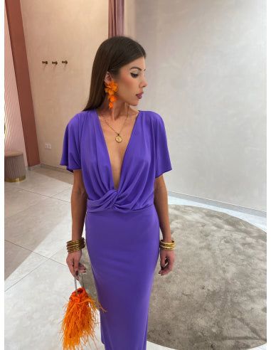 Vestido largo con mangas amplias y escote profundo ajustable ideal para un mira elegante