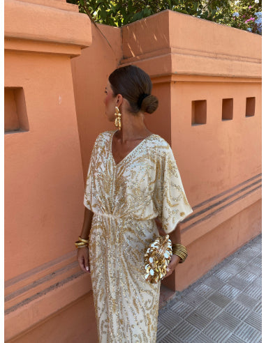 Vestido largo moderno y elegante con mangas amplias ideal para cualquier ocasión