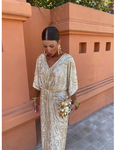 Vestido largo moderno y elegante con mangas amplias ideal para cualquier ocasión