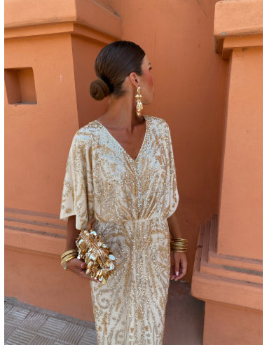Vestido largo moderno y elegante con mangas amplias ideal para cualquier ocasión