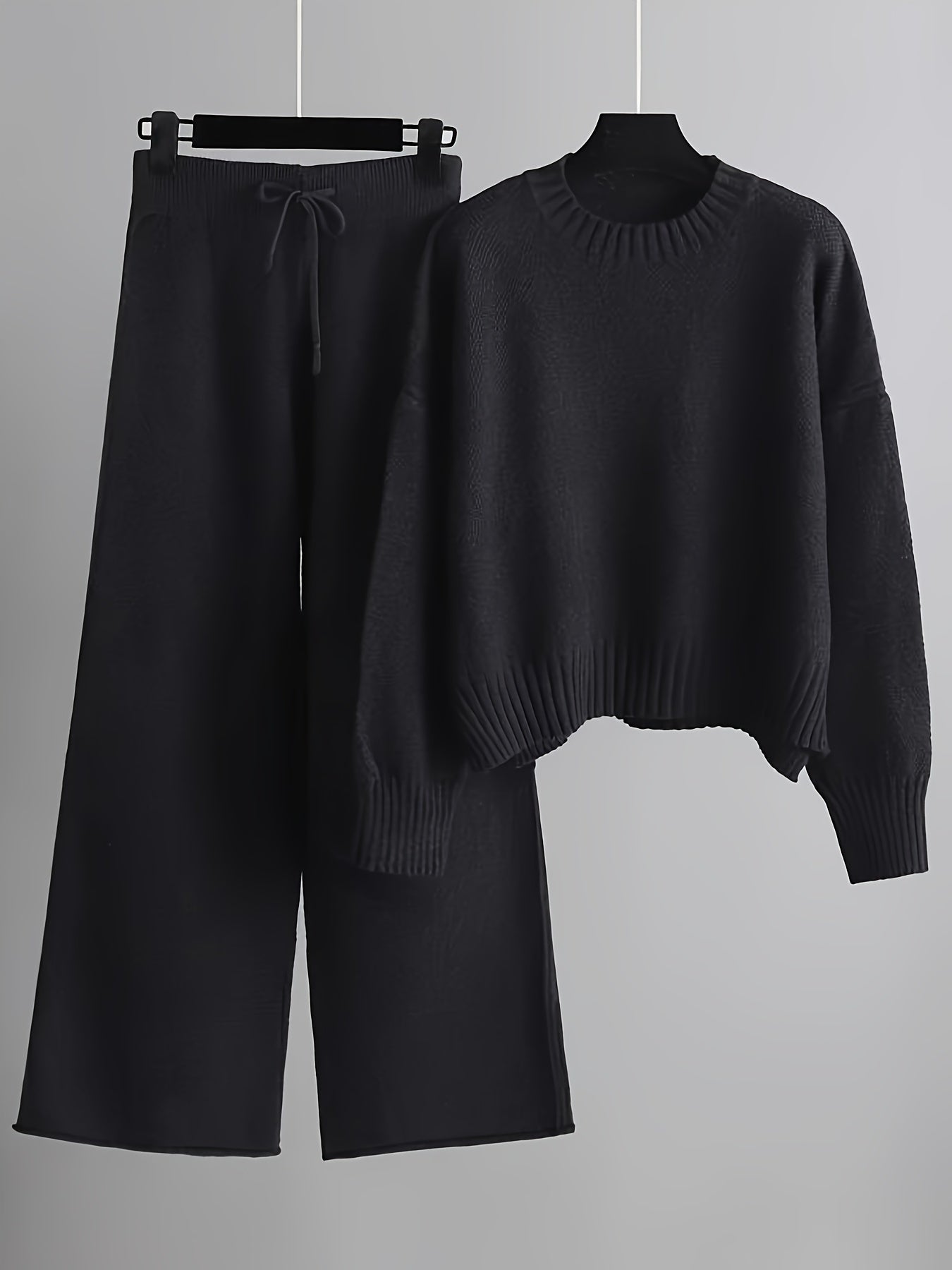 Conjunto elegante de jersey y pantalones anchos para mujer