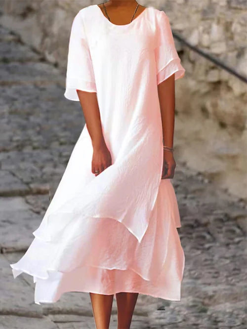 Vestido largo ligero con mangas cortas y falda de capas