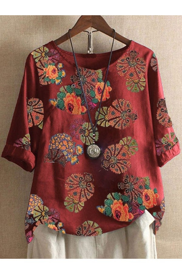 Arlette - Blusa roja de manga corta y estampado floral