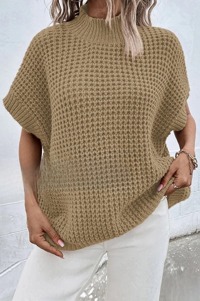 Elegante suéter beige con mangas abullonadas y cuello alto